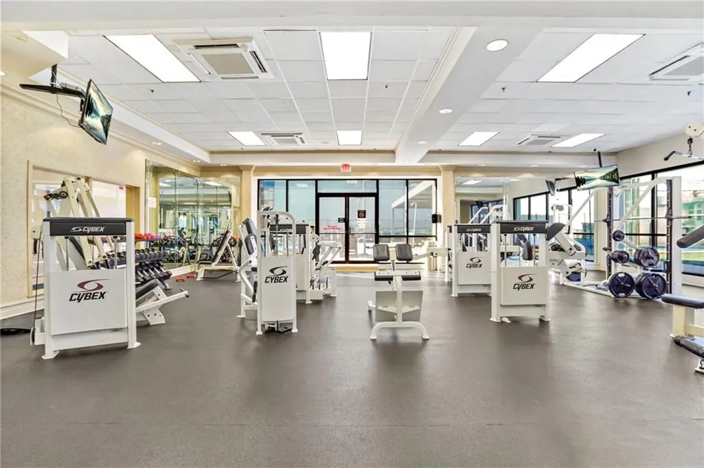 Gym with a drop ceiling and recessed lighting