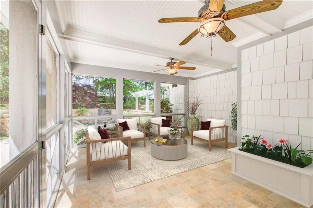 Virtually Staged. This porch is great for family fun and outdoor dining.