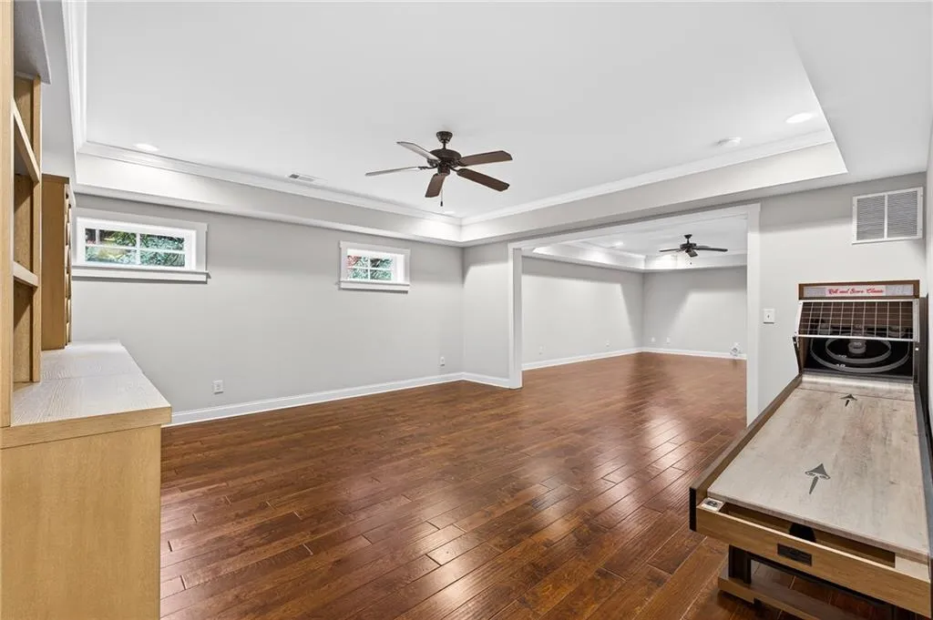Open living space in basement, perfect for additional family room, enterainment room, game room, separate office space available, endless options