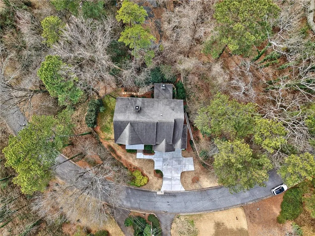 Aerial view of house and surrounding area