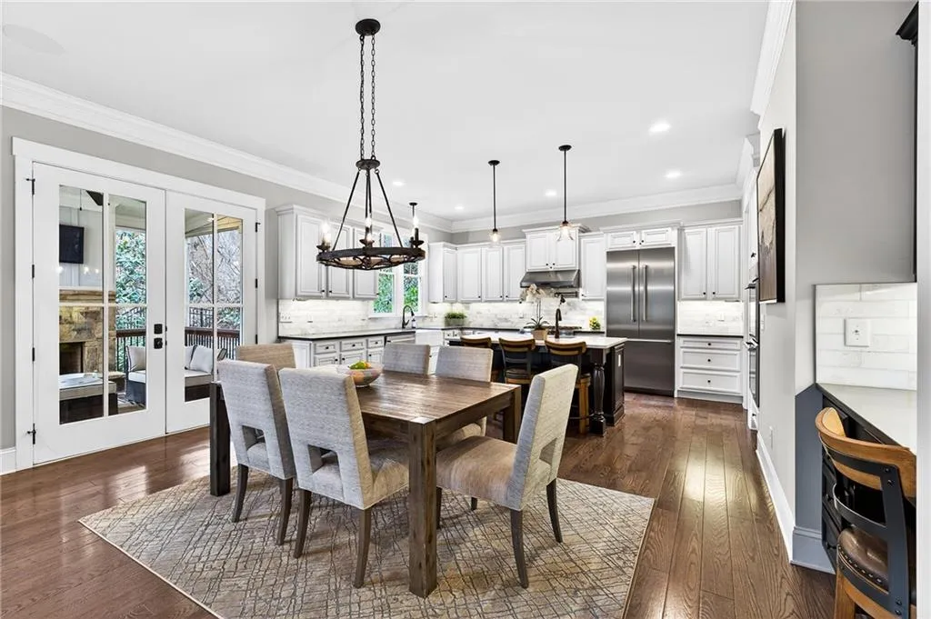 Eat-in kitchen overlooking screened in covered deck