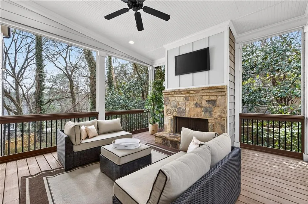 Covered screeded-in deck with fire place