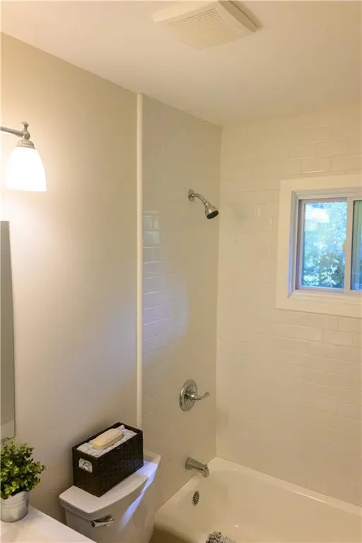 Full bath with shower / bath combination and vanity