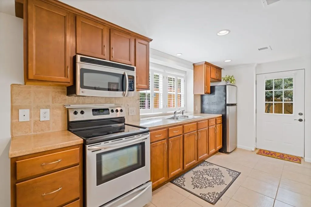 Fully Stocked Secondary Kitchen With Its Own Entrance Perfect For Additional Income Or Guests!