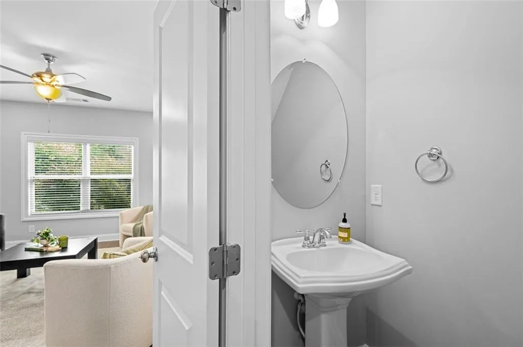 Bathroom featuring ceiling fan
