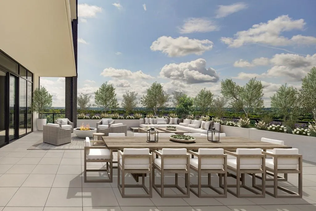 View of patio featuring an outdoor living space with a fire pit
