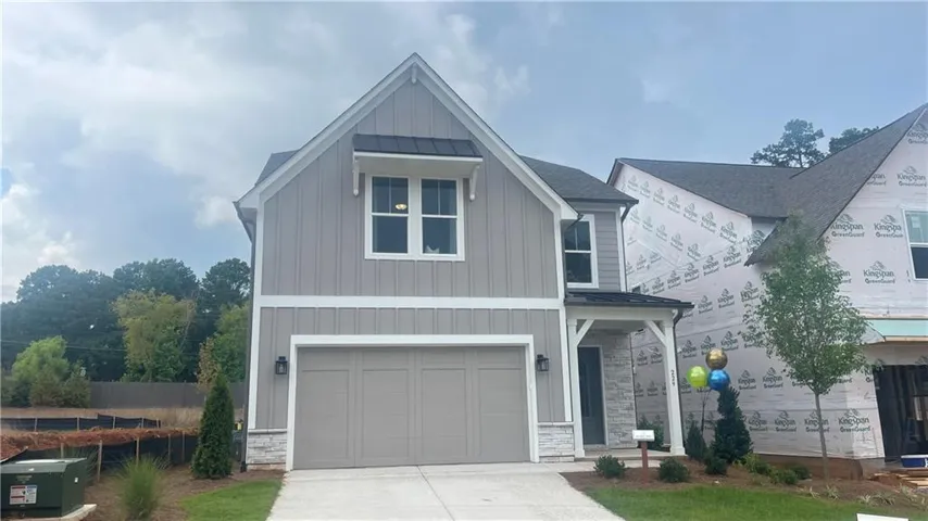 STERLING MODEL AT LOT 4. Photo shown is of the decorated Sterling A model and is intended to illustrate the floor plan only. Finishes, fixtures, furnishings, and design selections may vary and are not representative of the actual home.