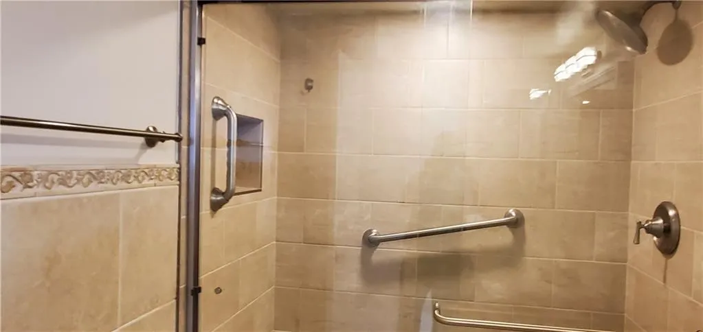 Bathroom with an enclosed shower