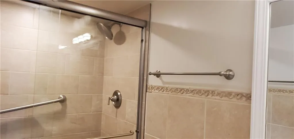 Bathroom with an enclosed shower