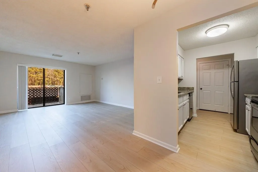Dining Area to Kitchen & Living Room