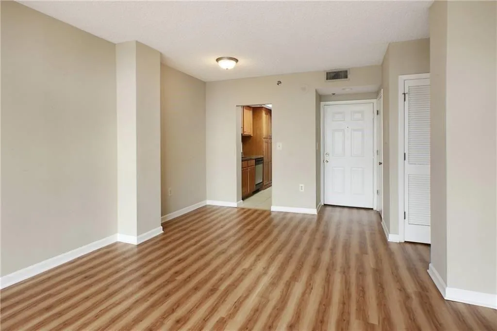 Easily transition from your living space to a cozy dining nook right before you enter the galley style kitchen. Your next home offers a spacious coat/storage closet and easy access to the bedroom.