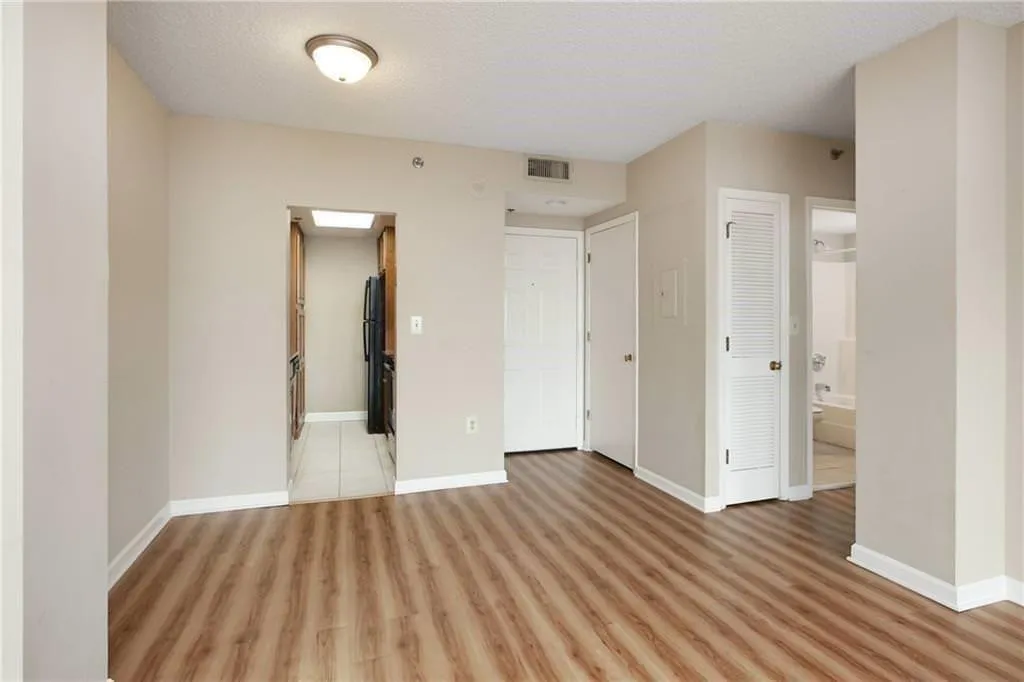 Easily transition from your living space to a cozy dining nook right before you enter the galley style kitchen. Your next home offers a spacious coat/storage closet and easy access to the bedroom.