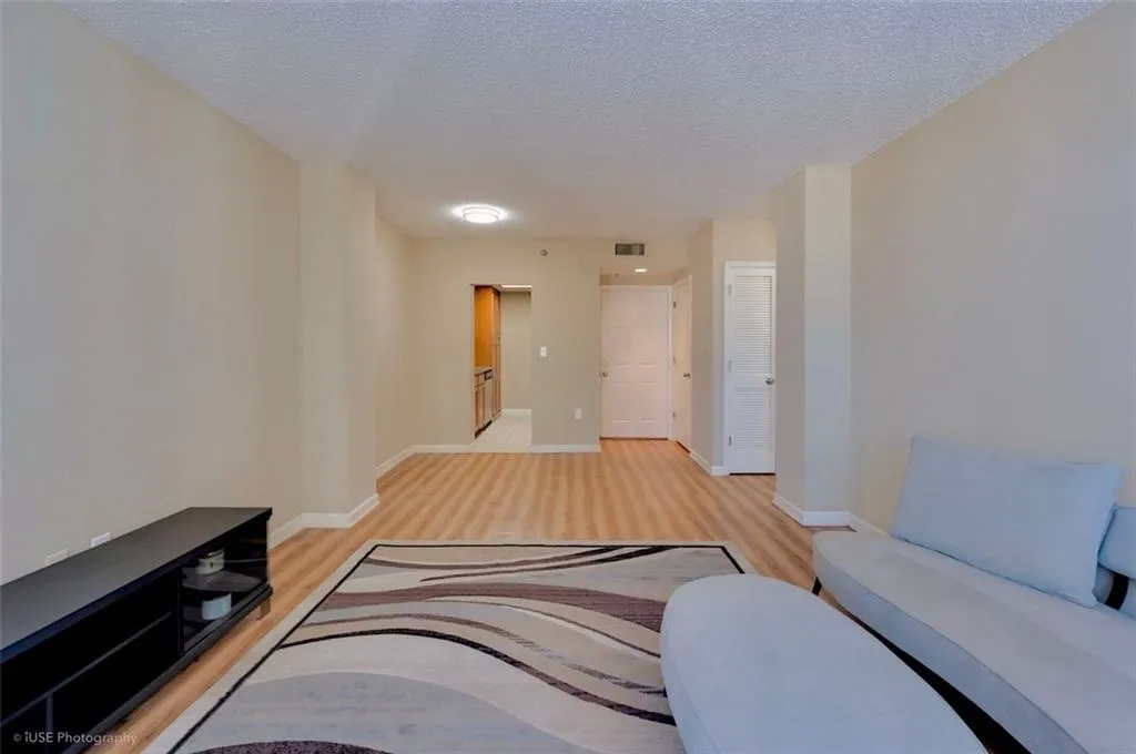 Easily transition from your living space to a cozy dining nook right before you enter the galley style kitchen. Your next home offers a spacious coat/storage closet and easy access to the bedroom.