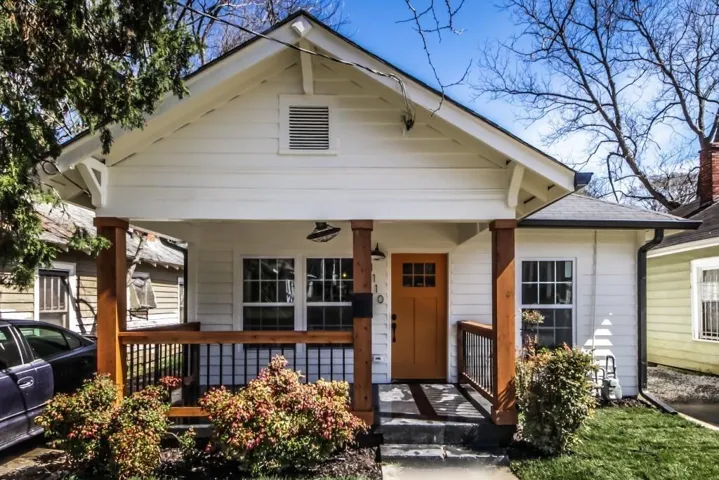 Sit on your front porch in the sweet little cottage !!.