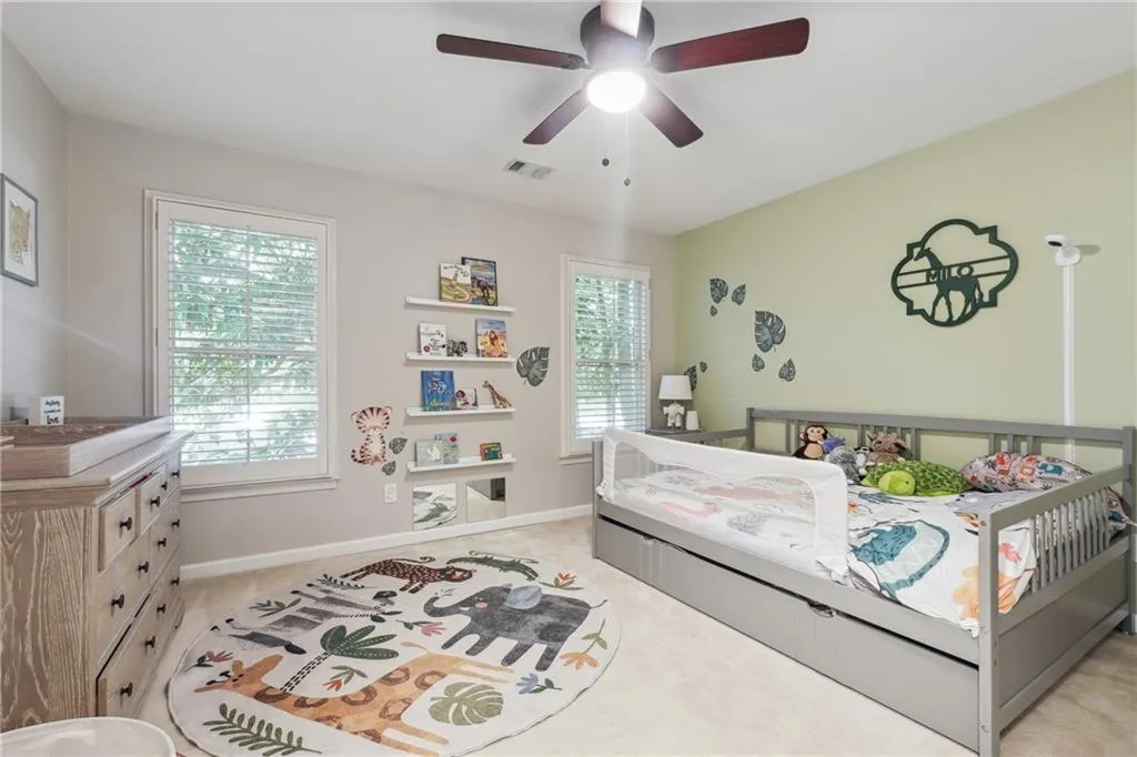 One of two secondary bedrooms (and a separate playroom) upstairs