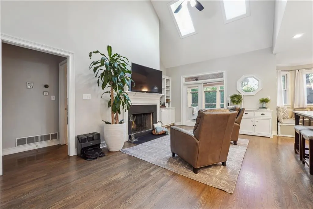 Tall two story vaulted ceilings and bright skylights in the family room, just off the kitchen.
