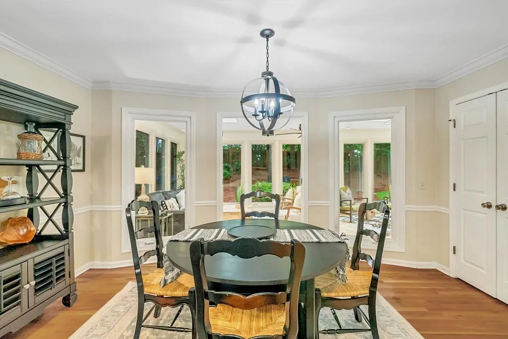All This Opens To Stunning Sunroom!
