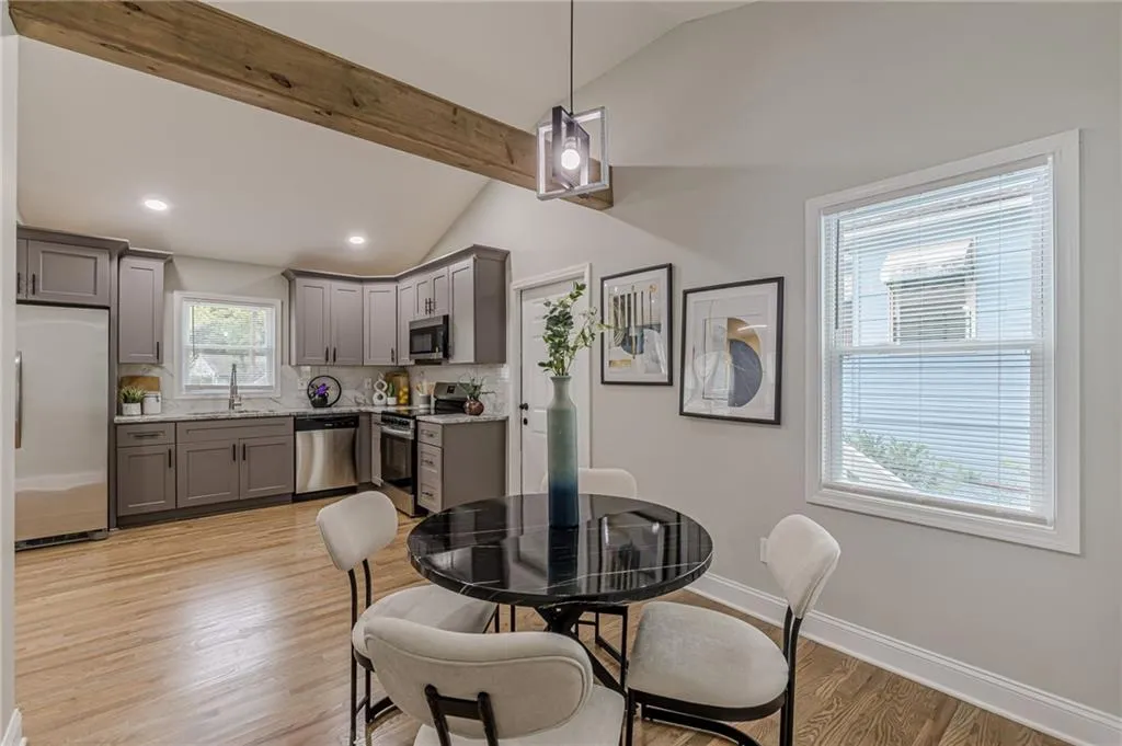 Dining room featuring light hardwood floors and recessed lighting