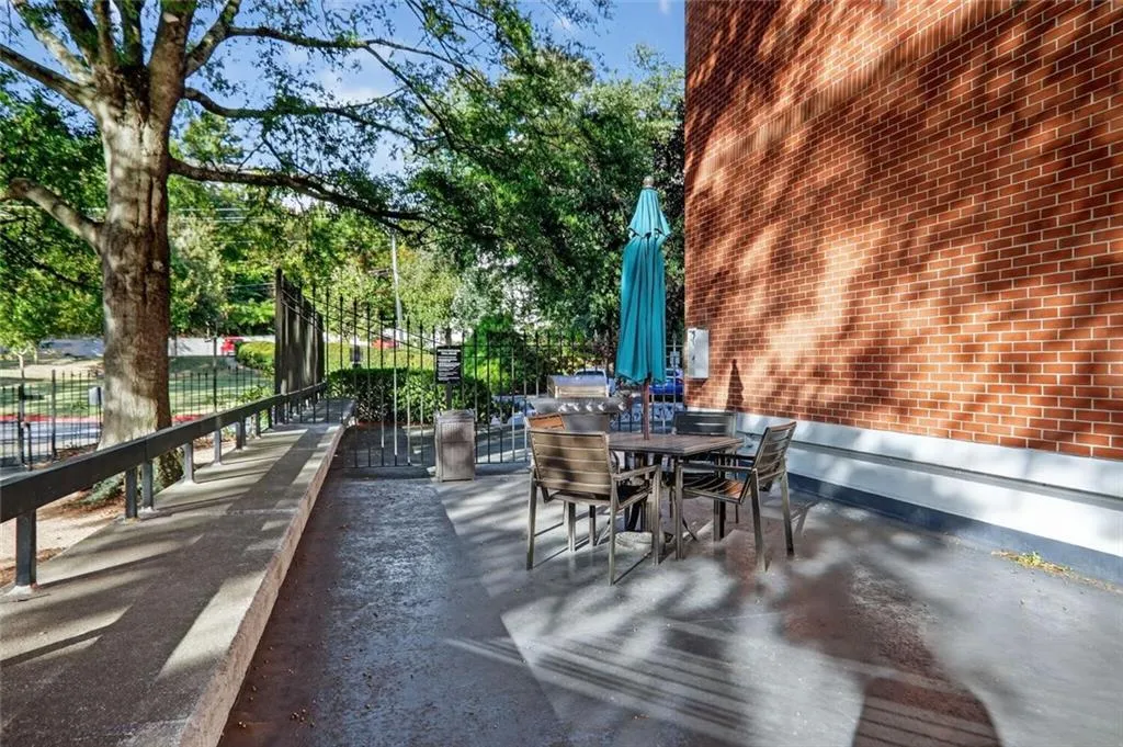 View of patio with outdoor dining space