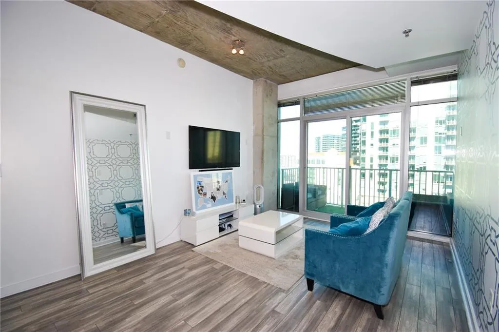 Living area with wood finished floors