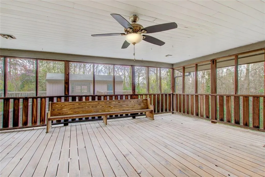 The kitchen door opens to the perfect screened in side  porch.