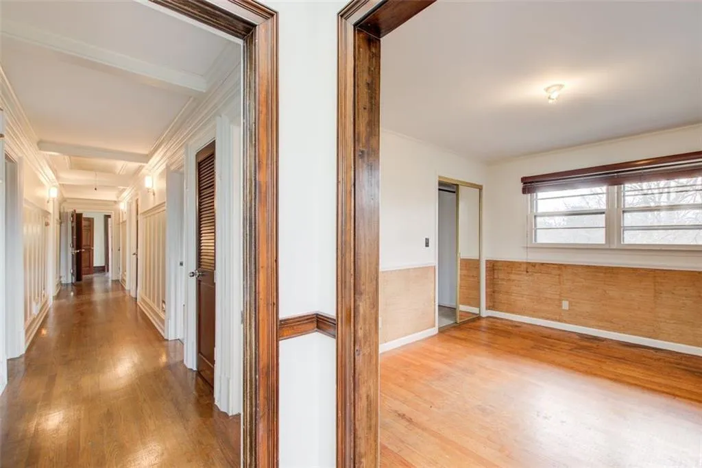 The hallway leading to 4 bedrooms on the main level.  This is a great family home.