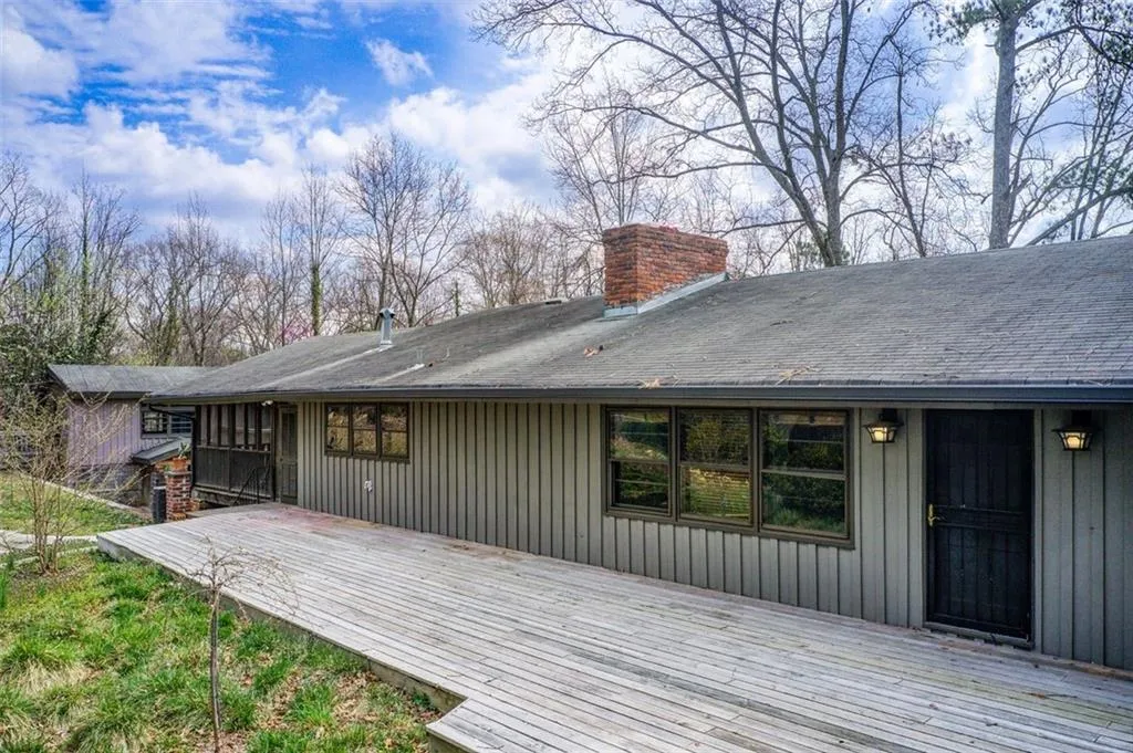 This large deck opens to the family room and the screened in side porch.