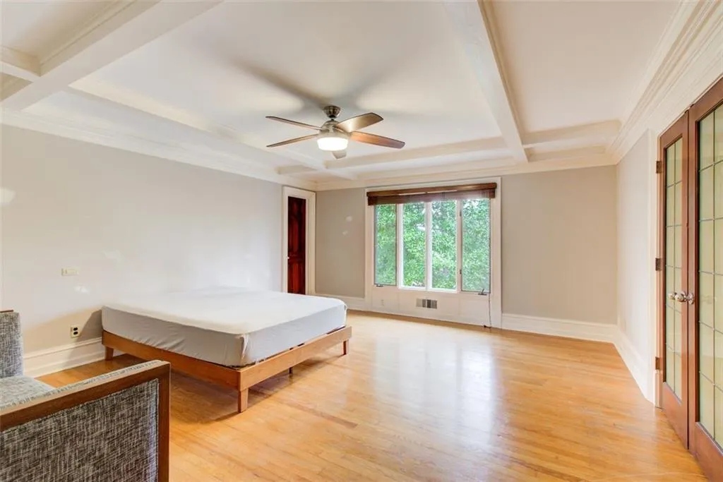 Primary suite with beautiful windows and views of nature