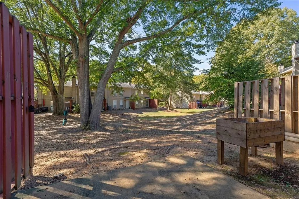 View of yard featuring fence