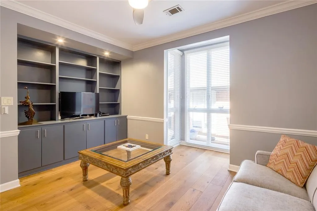 This room is currently being used as a library but can easily be converted back to a main level bedroom