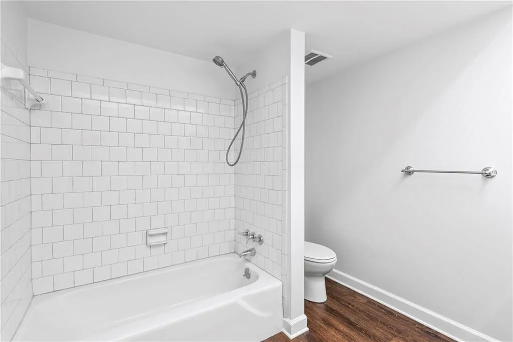 Neutral Updated bath is fresh and clean - bring your towels for a pop of color!