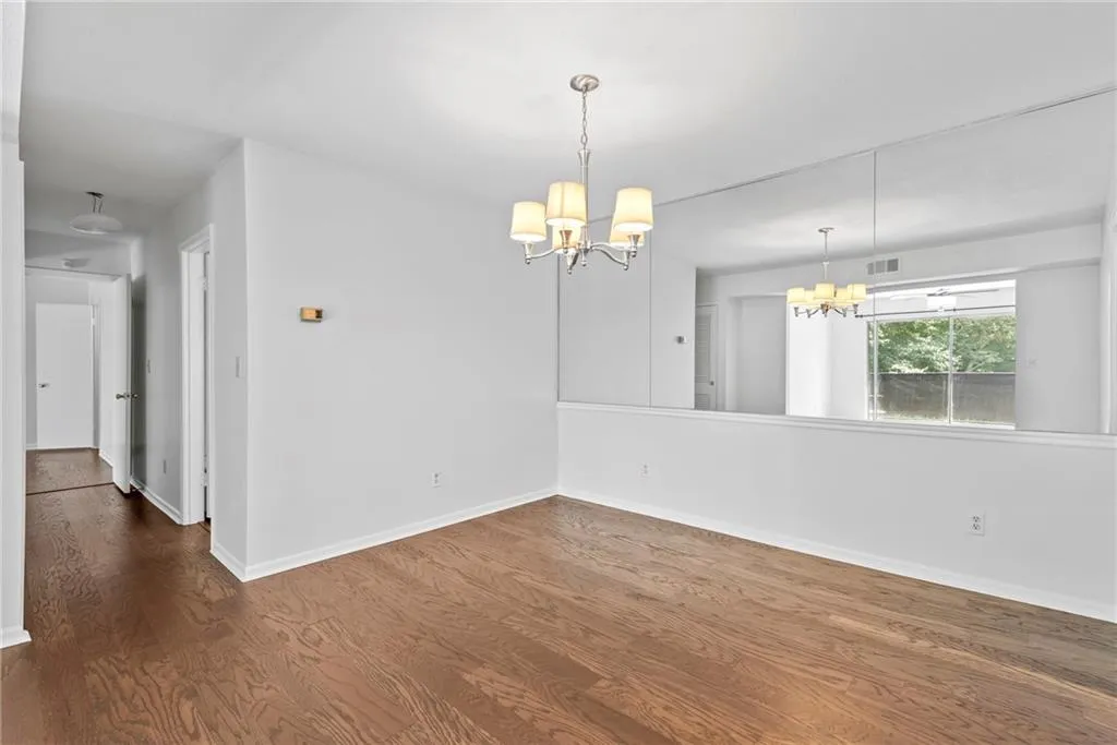 Dining room looking down hallway to bedrooms & baths