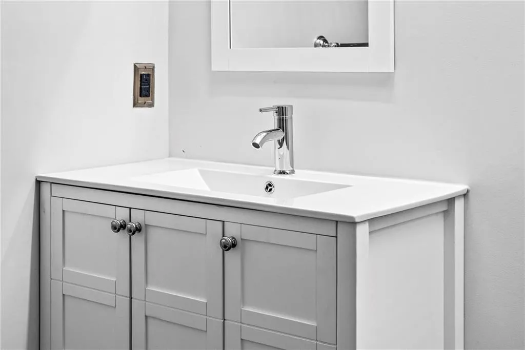 New vanity, vanity top and faucet.  Lots of adjacent space for your use!