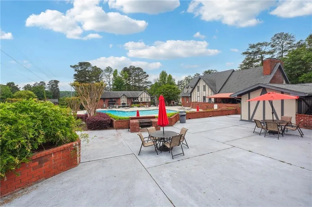 Lots of patio decking surrounds the pool - grilling station and outdoor dining.