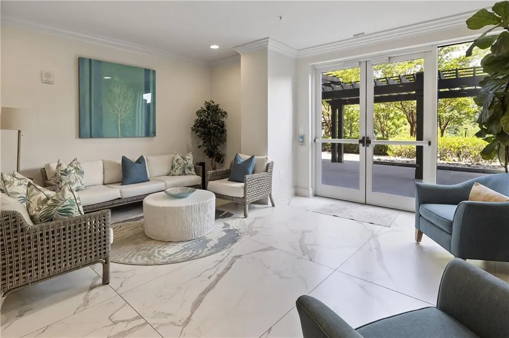 Community Room leads out to a common garden area with a grilling station and an outdoor covered patio to enjoy meals al fresco.