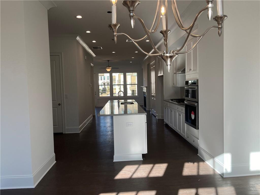 Great view from the Dining Room to the Family Room on Main level of this home.