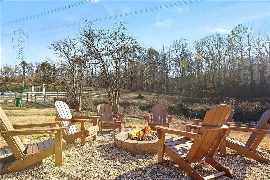 View of patio / terrace with an outdoor fire pit