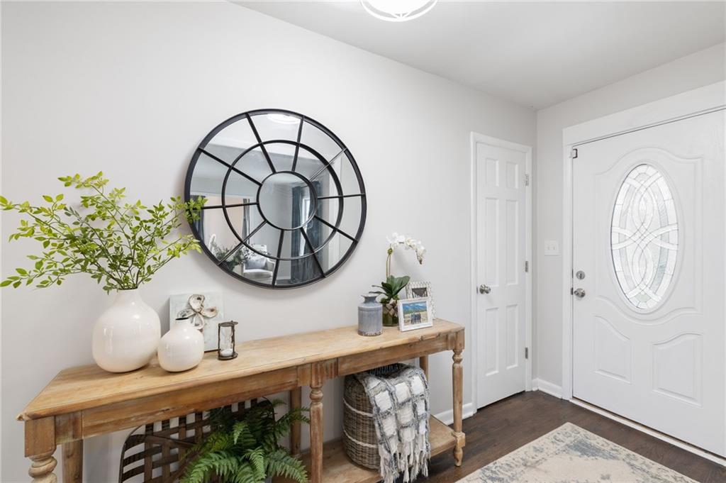 Step inside to discover a fully renovated interior that seamlessly blends traditional craftsmanship with contemporary flair.