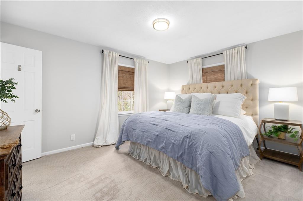 Retreat to the owners suite, complete with an ensuite bathroom and ample closet space.