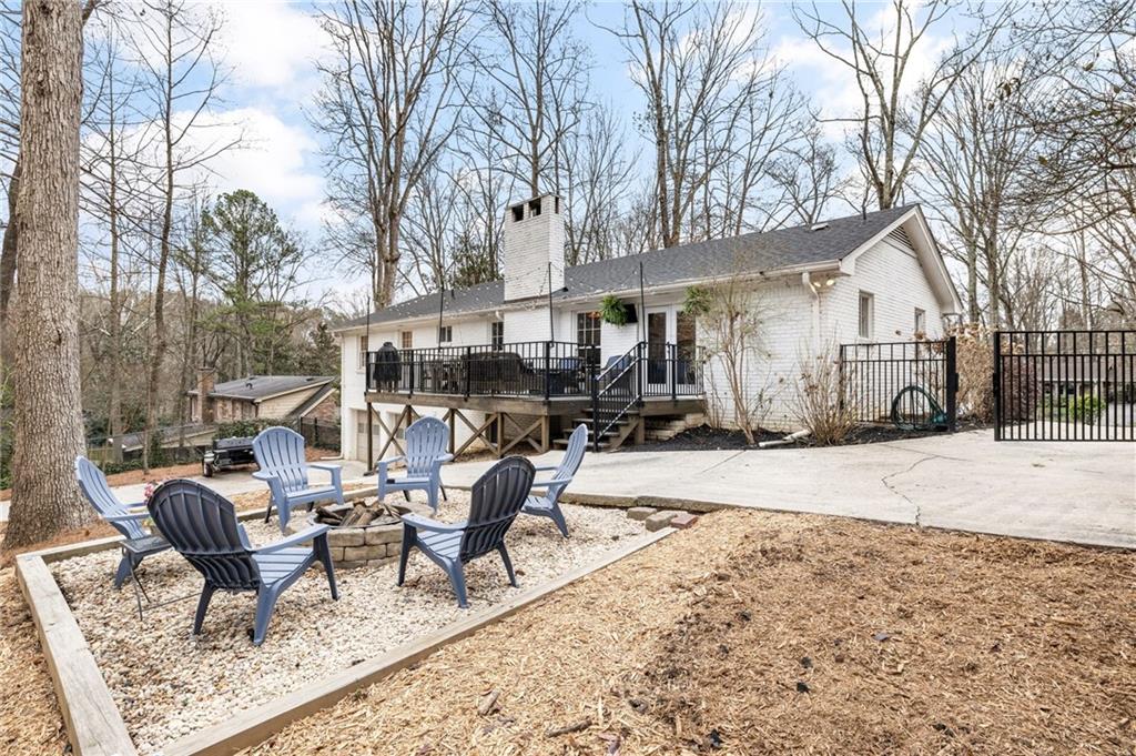Outside, the beautifully landscaped backyard is perfect for unwinding in the fresh air. Whether you're hosting a barbecue with friends or enjoying a quiet evening under the stars, this outdoor retreat is sure to delight.