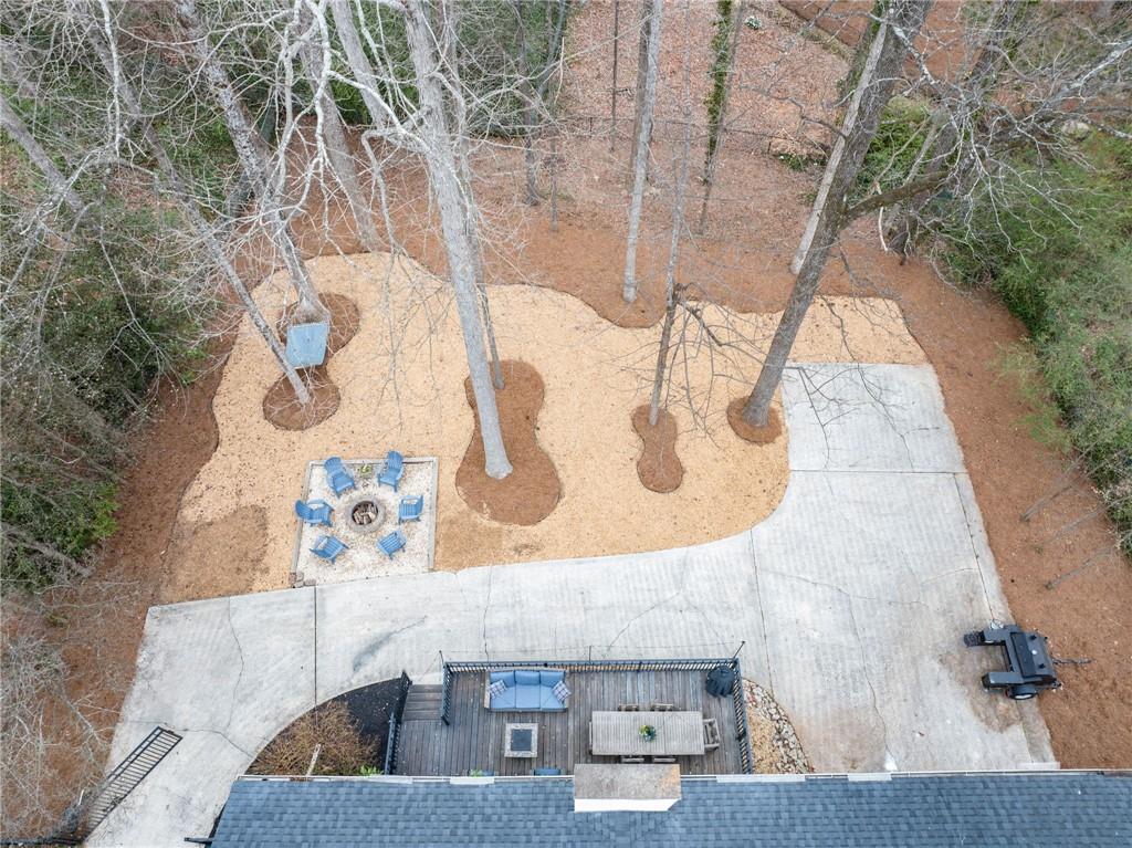 Outside, the beautifully landscaped backyard is perfect for unwinding in the fresh air. Whether you're hosting a barbecue with friends or enjoying a quiet evening under the stars, this outdoor retreat is sure to delight.