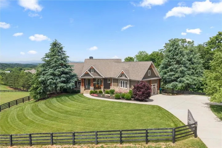 Equestrian Farmhouse Ranch with Long Range Mountain Views nestled on 13 Acres!