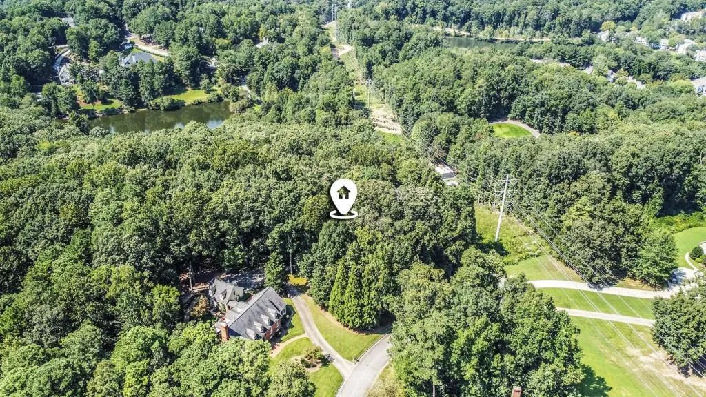 This lot offers the ideal combination of Privacy and Community within a Developed Neighborhood. Zoned for Top-Rated Spalding Drive Elementary School and just minutes from the Chattahoochee River and Orkin Lake, this property sits in the heart of the Sandy