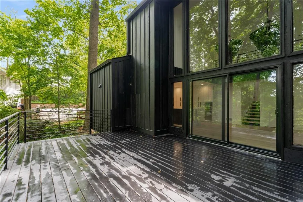 Main level deck offers ample space for a grill, dinning and living room lounge. Plumber for gas and water line for outdoor cooking.