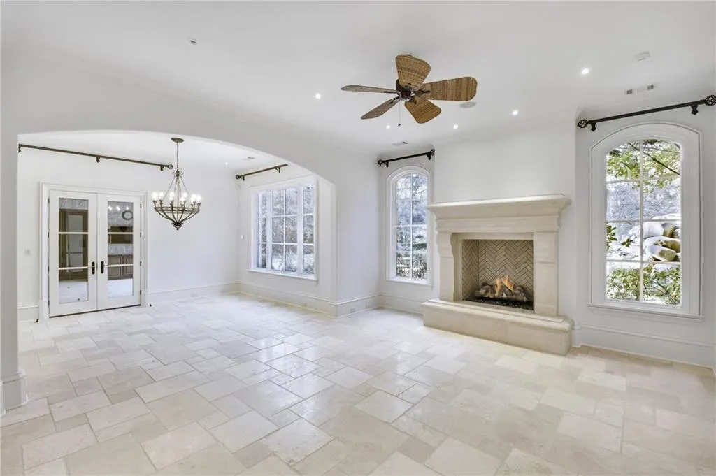 Arched doorways and windows with a raised hearth fireplace Arched doorways and windows with a raised hearth fireplace