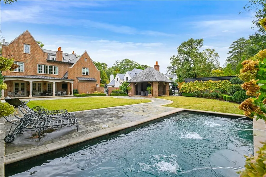 View of heated swimming pool and waterfalls