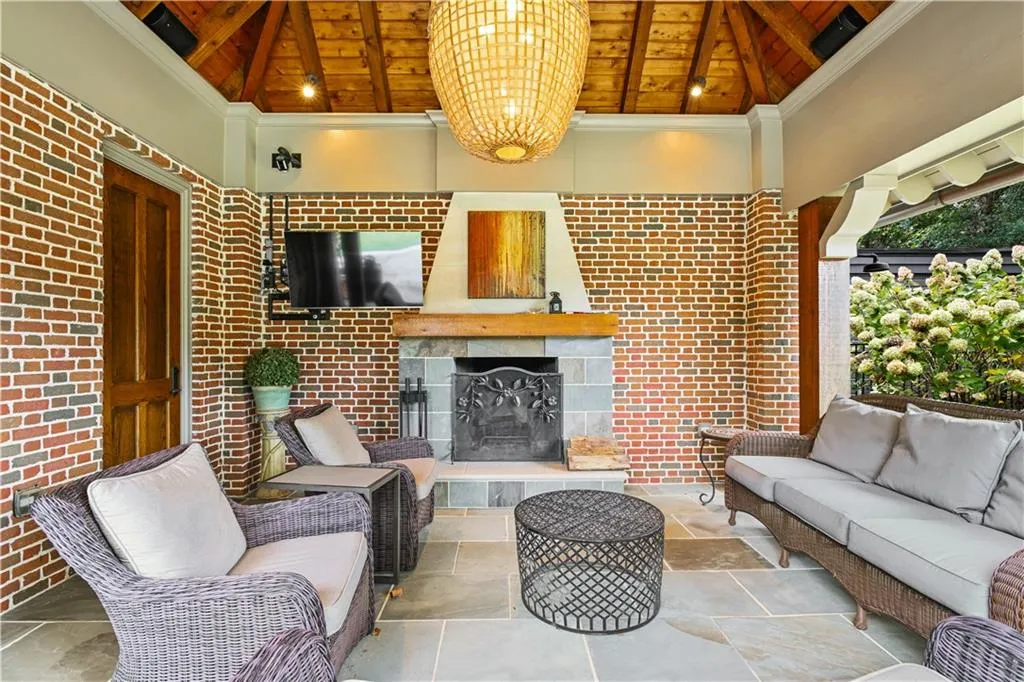 Outdoor covered pavilion with powder room & fireplace