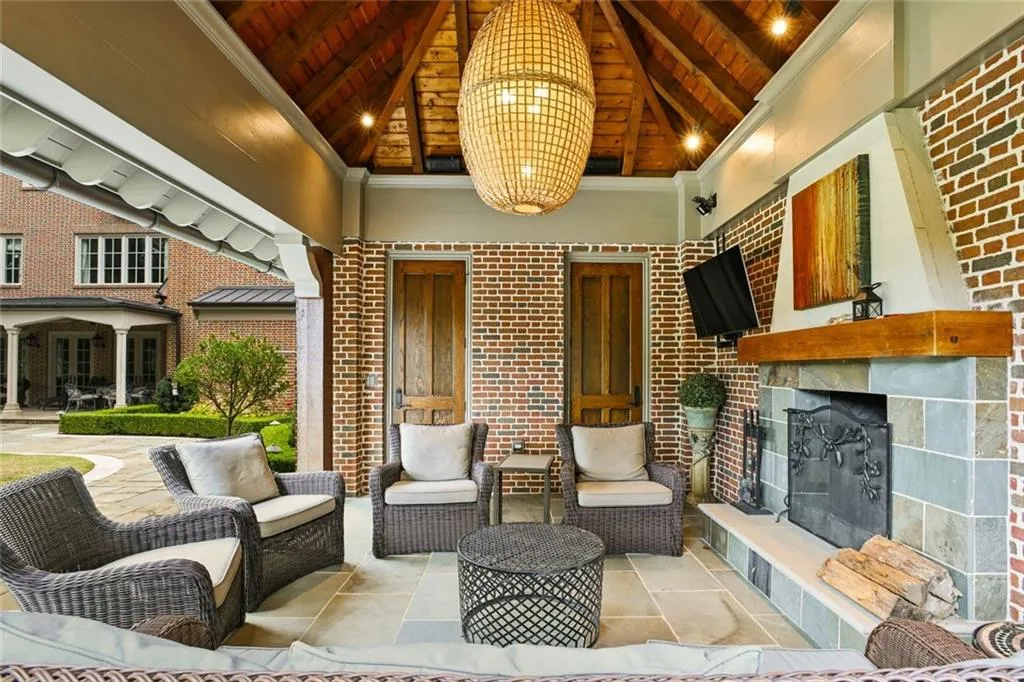 Outdoor covered pavilion with powder room & fireplace