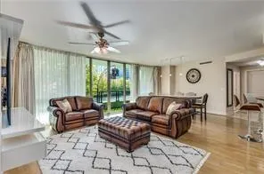 open floor plan concept with floor to ceiling windows