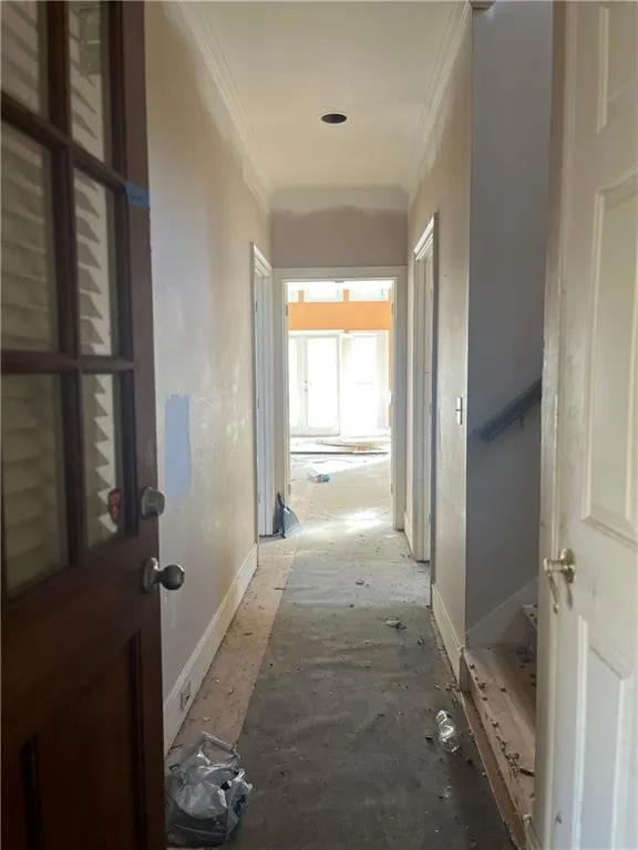 Hall featuring ornamental molding